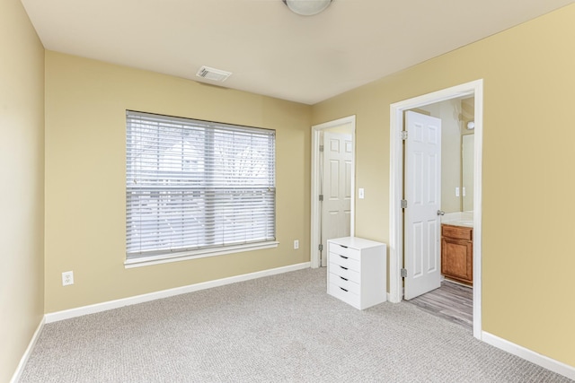 1382 Rural Hill Rd Unit 148, Antioch, TN 37013 - unfurnished bedroom featuring light carpet, baseboards, and visible vents