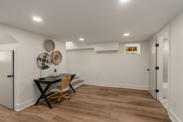 home office with recessed lighting, baseboards, and light wood-style flooring