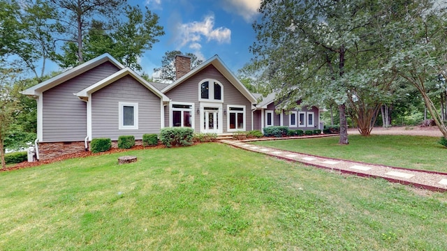 view of front facade with crawl space, a chimney, and a front lawn