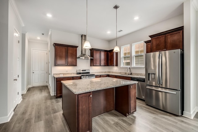 2053 Kirkwall Dr, Nolensville, TN 37135 - kitchen with dark brown cabinetry, a kitchen island, a sink, appliances with stainless steel finishes, and wall chimney exhaust hood