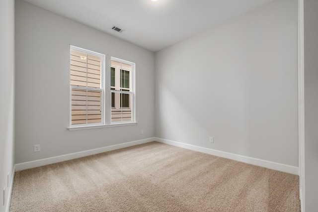 2053 Kirkwall Dr, Nolensville, TN 37135 - spare room featuring carpet floors, visible vents, and baseboards