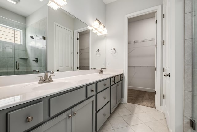 2053 Kirkwall Dr, Nolensville, TN 37135 - bathroom featuring double vanity, a stall shower, a sink, and tile patterned floors