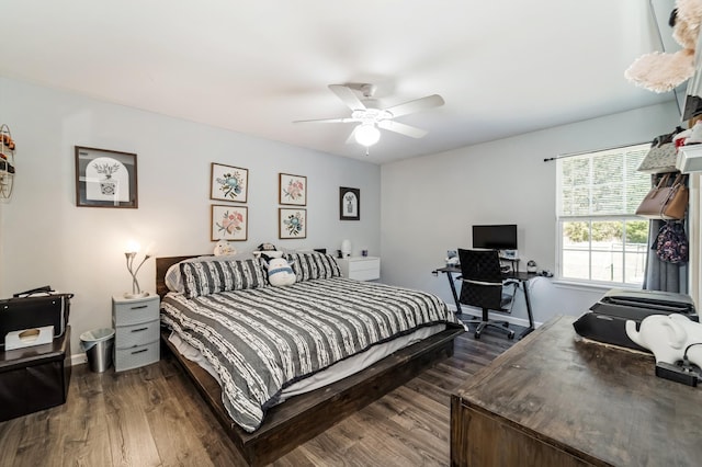 bedroom featuring dark wood-type flooring and a ceiling fan