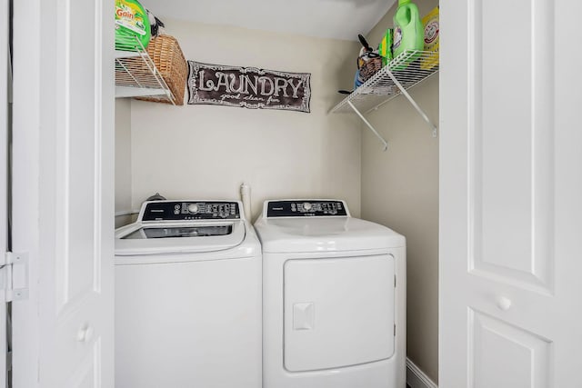 laundry area with laundry area and washing machine and dryer