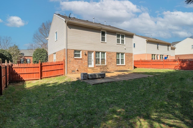 back of property featuring brick siding, a yard, central air condition unit, a patio area, and a fenced backyard