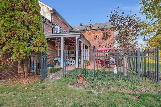 view of yard with a fenced backyard and a patio