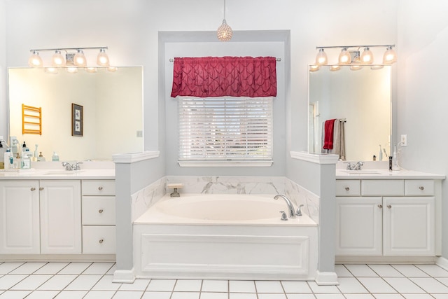 full bathroom with a garden tub, two vanities, a sink, and tile patterned flooring