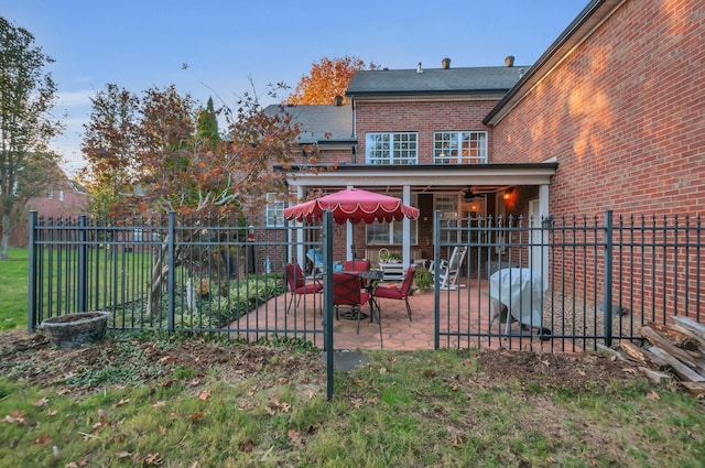 exterior space featuring a fenced backyard and a patio