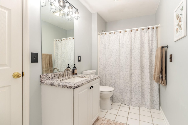 full bathroom featuring tile patterned flooring, toilet, vanity, baseboards, and a shower with curtain