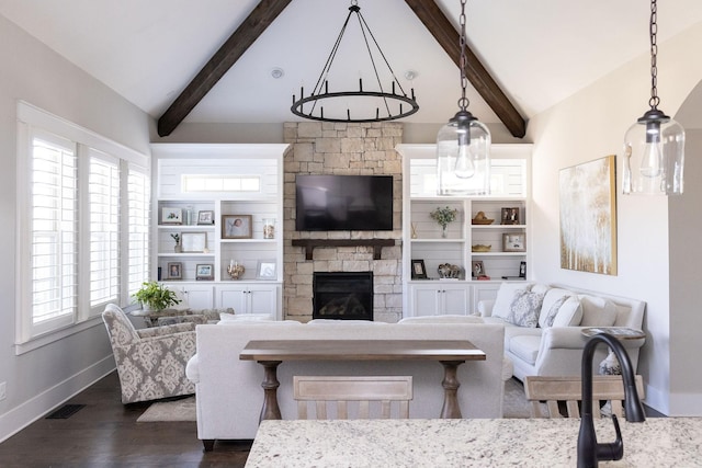 living room with lofted ceiling with beams, a stone fireplace, visible vents, and baseboards