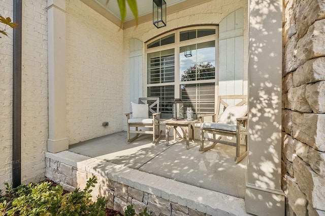 view of patio featuring a porch