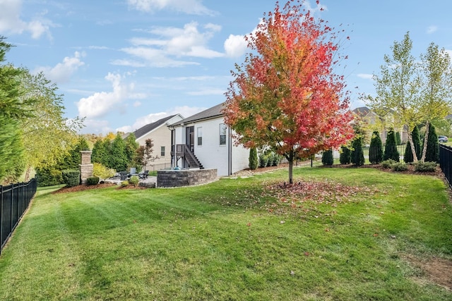 view of yard featuring a fenced backyard