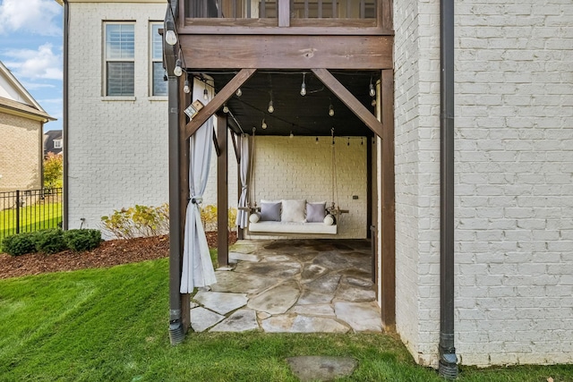 view of patio / terrace featuring fence