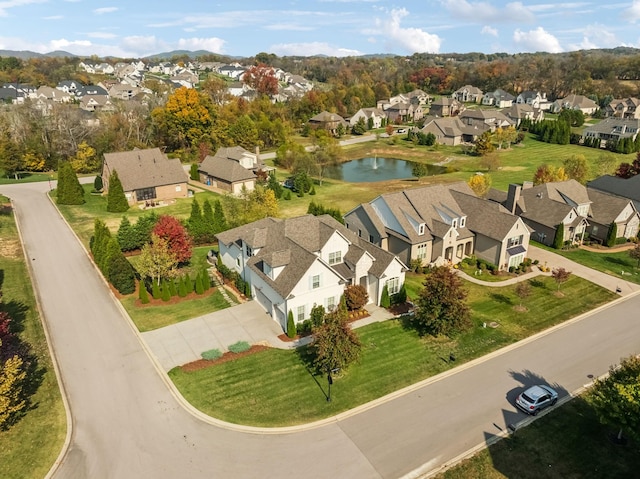 aerial view with a residential view and a water view