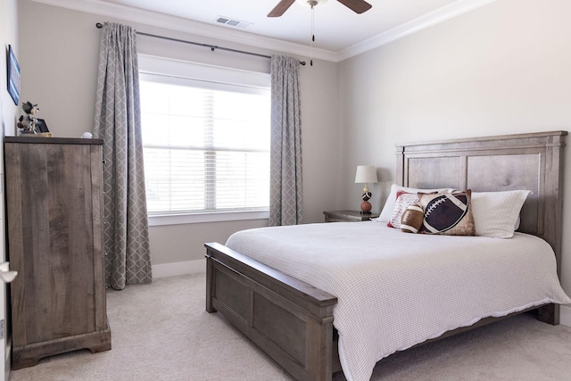 bedroom featuring visible vents, ornamental molding, carpet flooring, ceiling fan, and baseboards