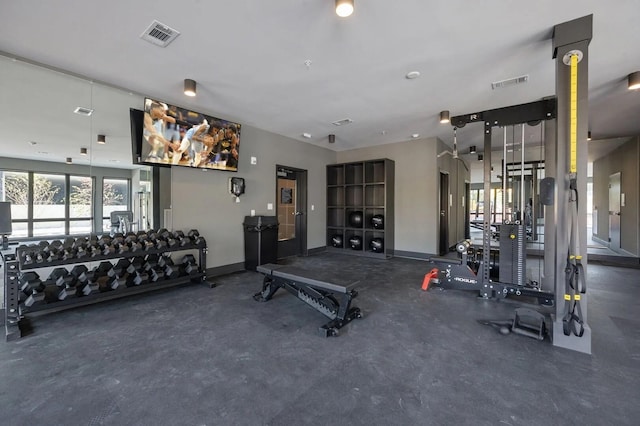 workout area with baseboards and visible vents