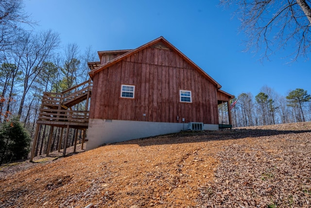 view of property exterior with crawl space