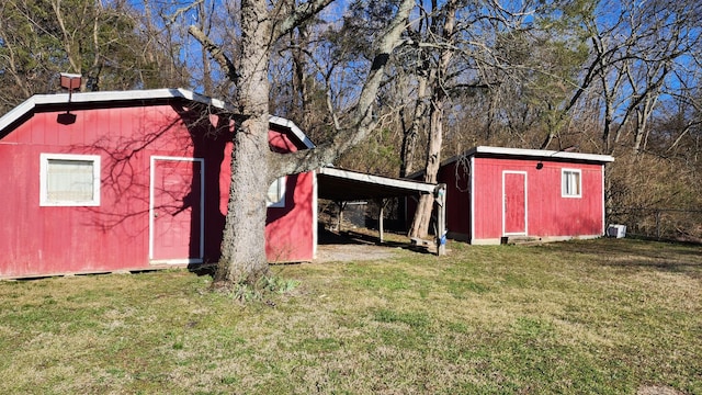 view of shed featuring a carport