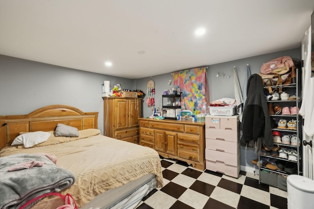 bedroom featuring recessed lighting and tile patterned floors