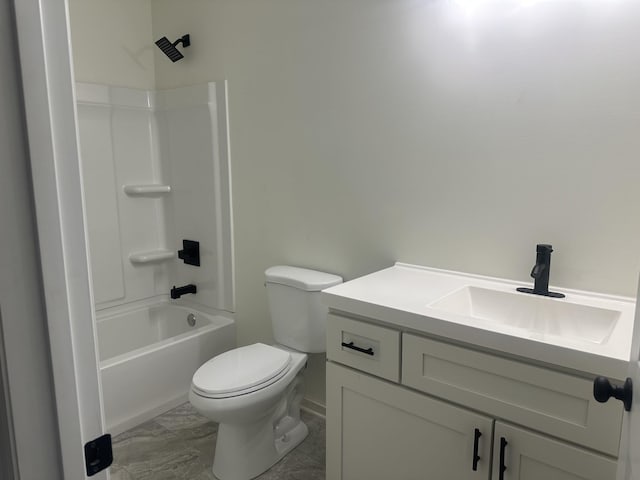 full bathroom with toilet, marble finish floor, tub / shower combination, and vanity