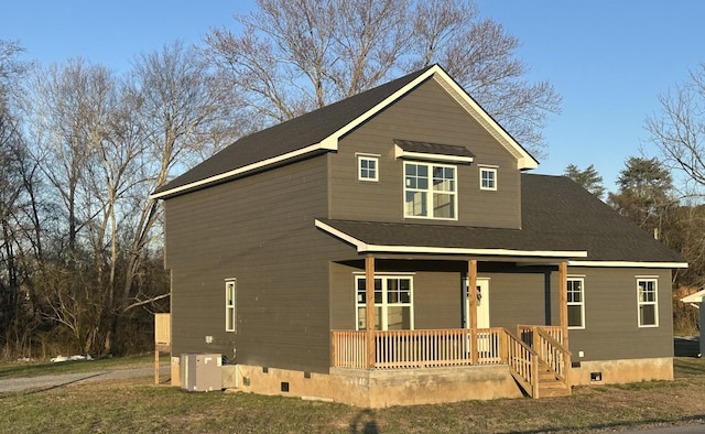 view of front of house featuring a porch, crawl space, and cooling unit