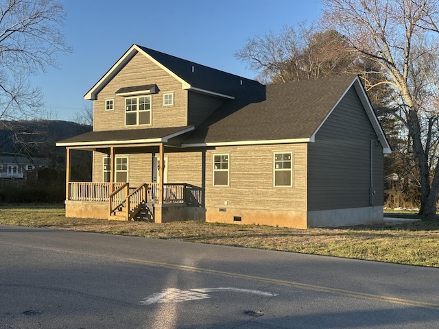 view of front of property featuring a porch and crawl space