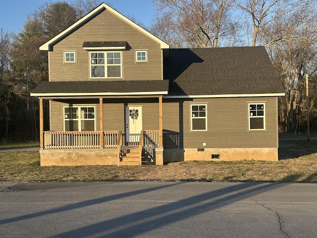 view of front of house featuring covered porch and roof with shingles