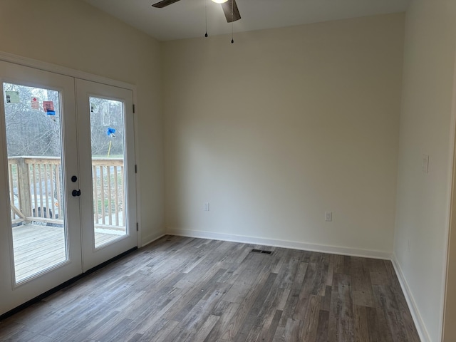 doorway with ceiling fan, baseboards, wood finished floors, and french doors