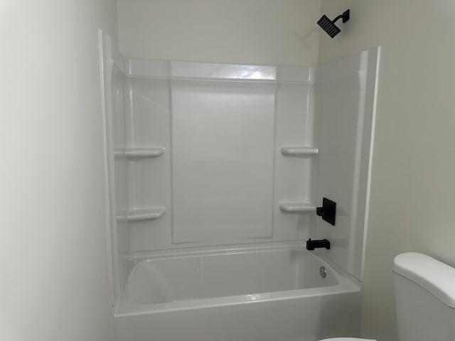 bathroom with toilet and walk in shower