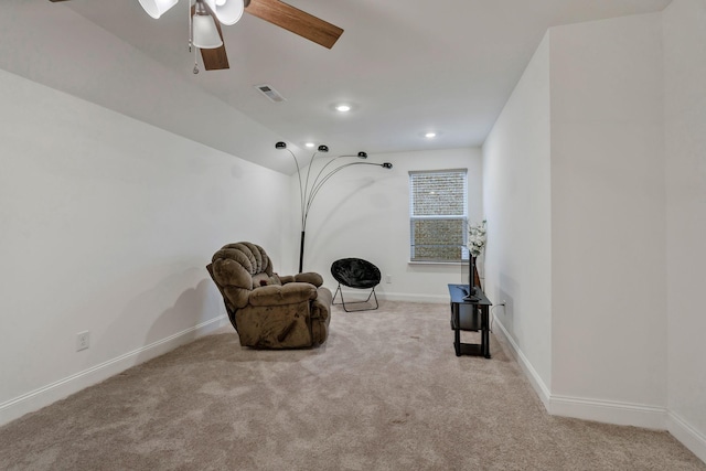 sitting room with carpet floors, recessed lighting, visible vents, and baseboards