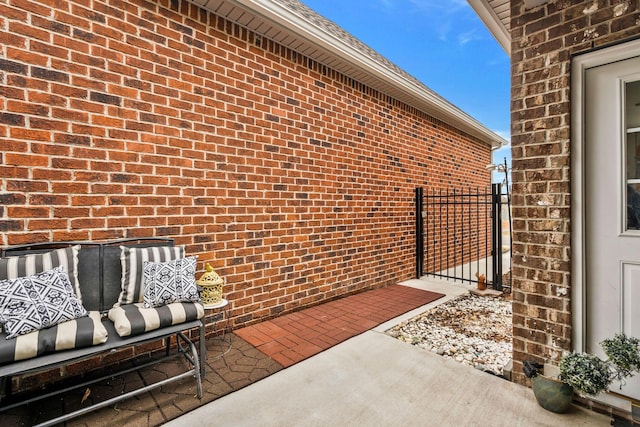 view of patio featuring fence