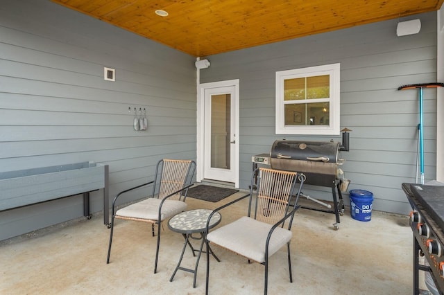 view of patio with a grill