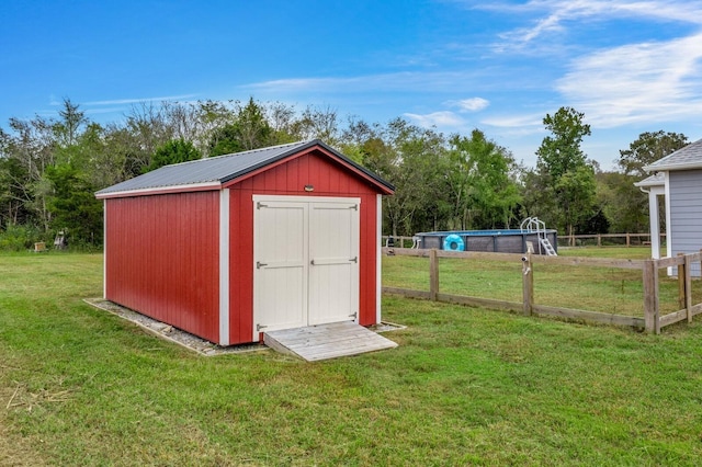 view of shed with an outdoor pool