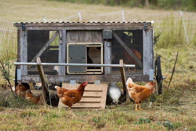 exterior space featuring an outbuilding and exterior structure