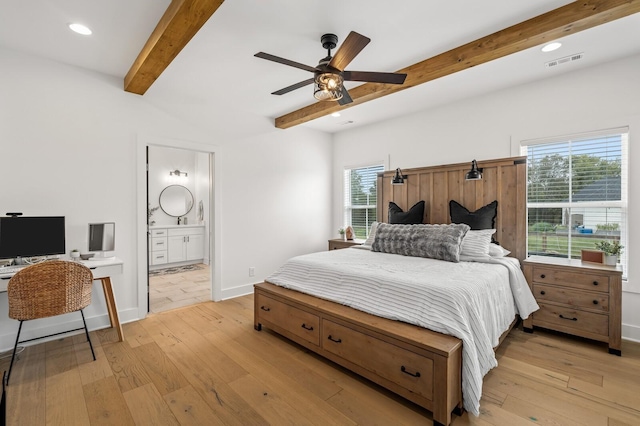 bedroom with light wood finished floors, beamed ceiling, visible vents, and baseboards