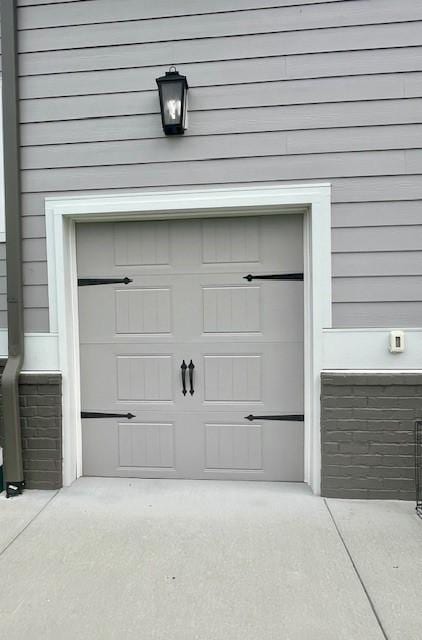 garage with driveway