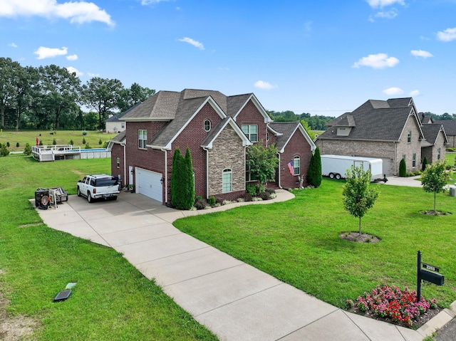 view of front facade with brick siding, a shingled roof, an attached garage, driveway, and a front lawn