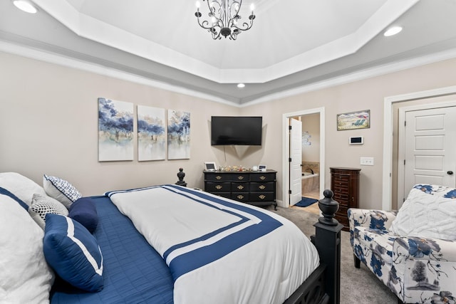 bedroom featuring connected bathroom, recessed lighting, carpet flooring, a raised ceiling, and an inviting chandelier