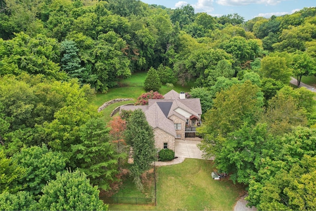 aerial view featuring a view of trees