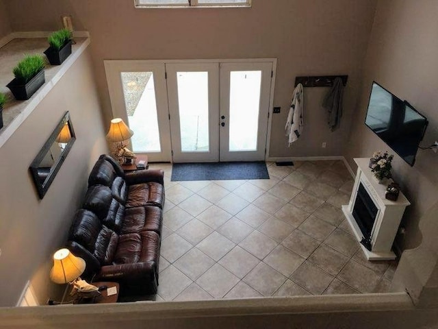 tiled entrance foyer with french doors