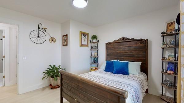 bedroom with light wood-style flooring