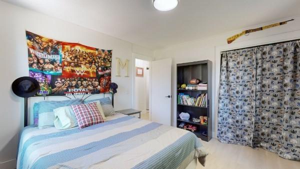 bedroom with a closet and wood finished floors