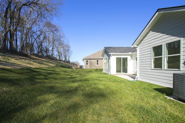 view of yard featuring central AC unit