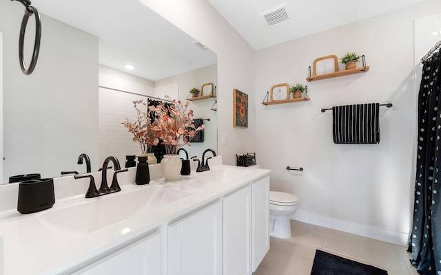 full bath featuring tile patterned flooring, toilet, visible vents, and a sink