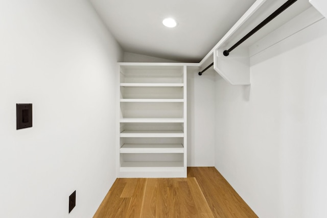 spacious closet with wood finished floors