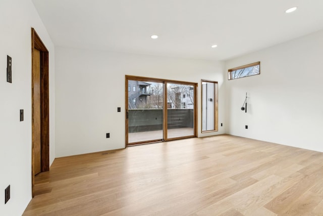 empty room featuring light wood-style floors and recessed lighting