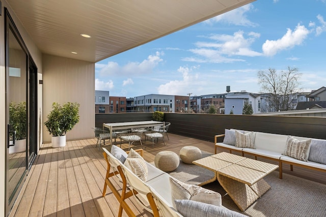 deck featuring a residential view and an outdoor hangout area