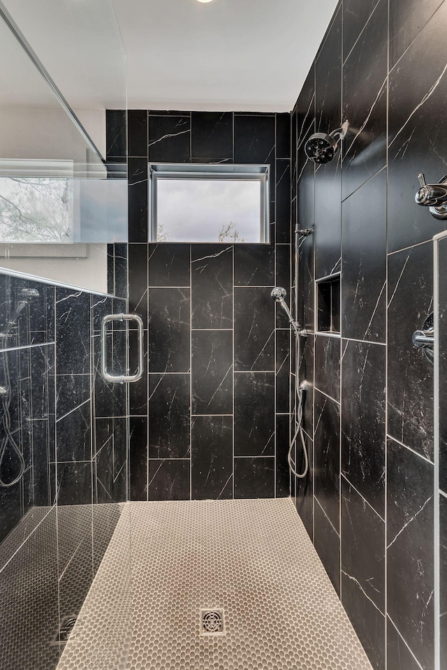 bathroom with a stall shower