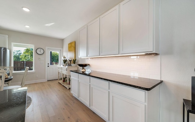 7228 Fairlawn Dr, Fairview, TN 37062 - kitchen featuring tasteful backsplash, light wood finished floors, white cabinets, and recessed lighting