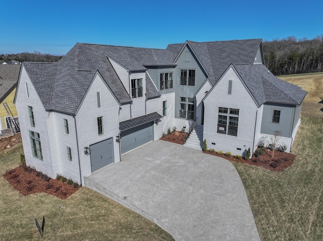 view of front facade with an attached garage, brick siding, a shingled roof, driveway, and crawl space